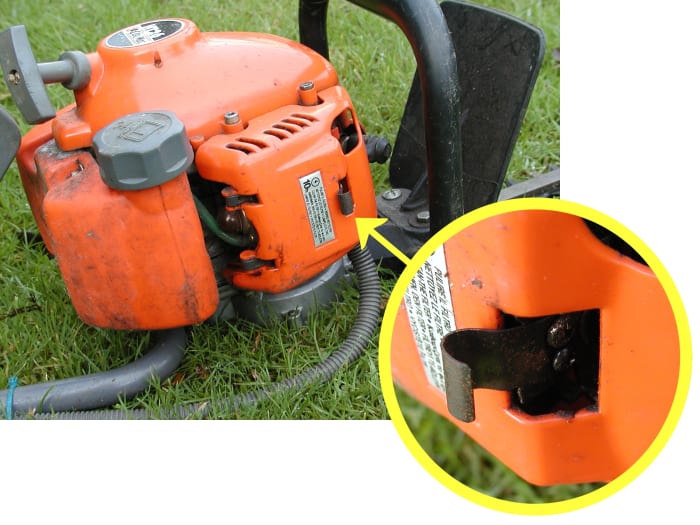 Spring clips can be made from clocksprings. I replaced the broken plastic clip on the cover of this hedge trimmer with a piece of clock spring