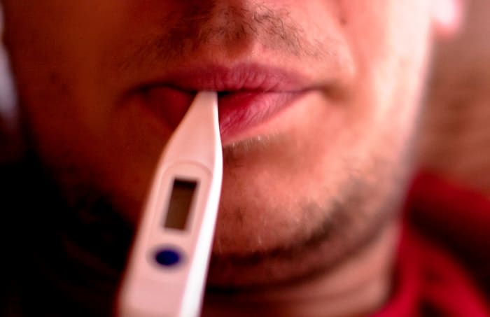 Employers should provide workers guidance on what they consider "too sick to work."