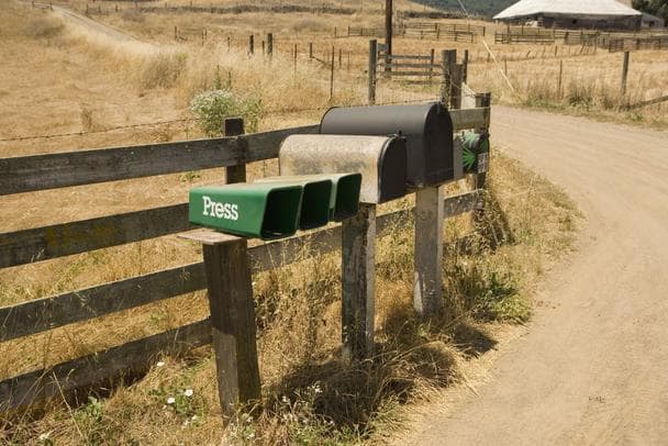Scenes such as this are not necessarily as typical of a rural carrier's life as they used to be.