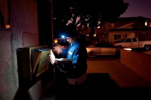 This letter carrier appears to be quite serene and untroubled by nightfall, having most certainly taken the Chinese proverb "Better to light a candle than curse the darkness," to heart.