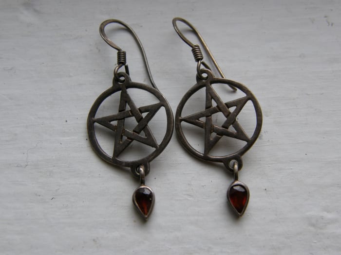 Not to be confused with Satanists, Wiccans follow a nature-based pagan religion and celebrate seasonal festivals called Sabbats.
