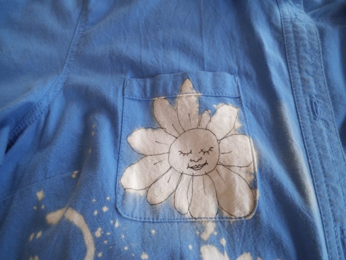 I added more bleach spots and then used a Sharpie marker to make designs of those. Unique and fun.