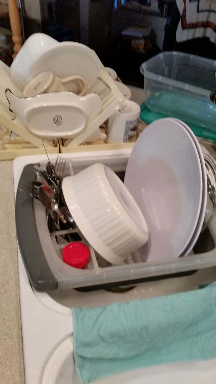 The dishes are done and I used very little water. I feel good that I saved water and did not fill up the wastewater storage tank on our RV.
