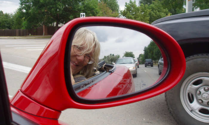 Carpooling with a friend in Colorado. We drove to the local reservoir, then up into the Rocky Mountains. She said carpooling with me was fun––that we went to places she'd never seen before.