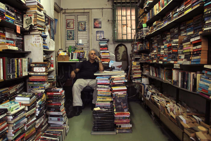 An Israeli bookseller in his shop