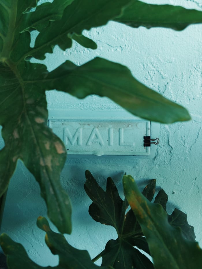 Once it goes through the crack you can't get it back. Are you sure the mail in your hand matches this address?