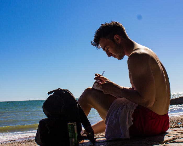 When you see a cute guy sitting alone on the beach, take a photo of him and see how he reacts. Unlike women, men love to be swooned at by strangers.