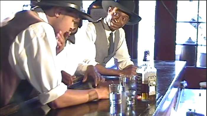 This reenactment shows a young W.C. Handy (with hand on chin) realizing that the lyrics of his blues song "Mr. Crump Blues" would not be flattering to E.H. "Boss" Crump, the mayor of Memphis. (Reenactment)