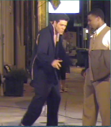 In this reenactment, Robert Henry, Beale Street Promoter and friend of young Elvis, looks on as the youth imitates his early idol Ukelele Ike.