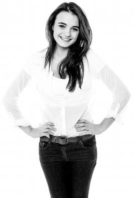 Help her get over her shyness by complimenting her heavily when she wears something that really looks pretty.