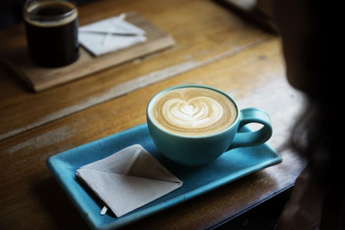 Have a long chat over some coffee. Ask him to come right out with it if he wants to get back together.