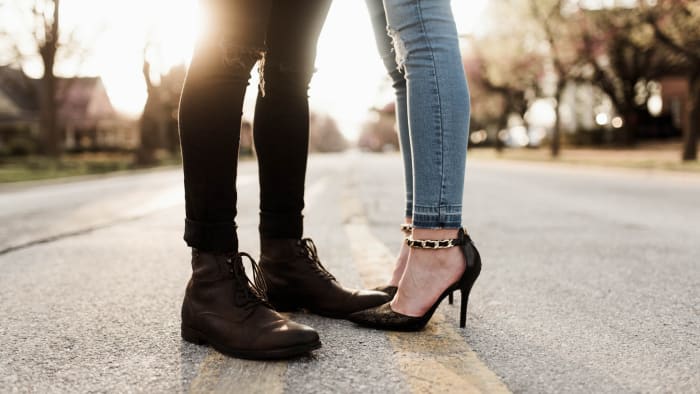 Wondering if your friend likes you? Take a peek at their feet—if they're pointed directly at you, it may be a sign they want to be more than friends.