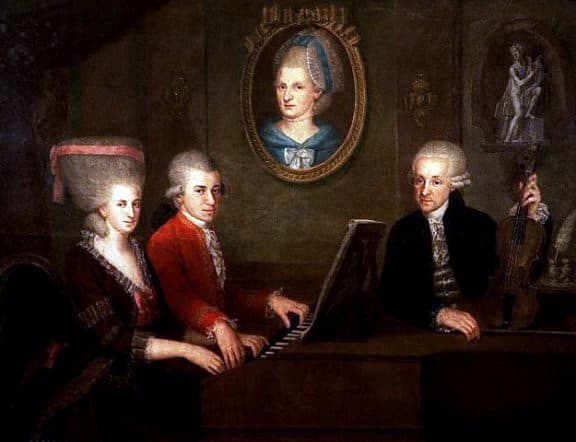 Here we see a Mozart family portrait circa 1780. Seated at the piano is Mozart and his sister Maria Anne. To the right of them is their father Leopold, and in the background is a portrait of their mother Anna Maria.
