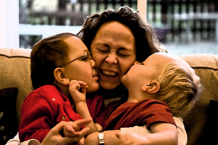 Take time to enjoy the little things in life, like warm hugs and sticky kisses from your kids. One day you'll look back and realize they were bigger than you thought.