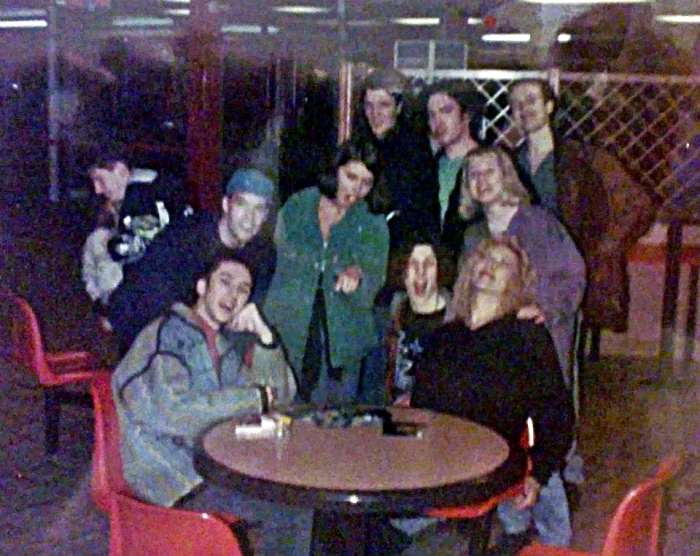 Hanging out at the motorway services - Carl (Bollie) seated on the left; Carol in green jacket (standing, centre); me seated on the right, next to Grayson, with Adele (purple jacket) standing behind me. Standing at the back (right) is Pete.
