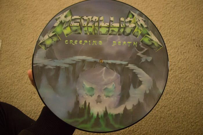 A rare picture disk variant of the "Creeping Death" single from my collection. It sounds worn out but it still looks cool.