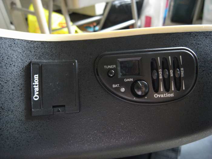 Top/back and electronics of an Ovation guitar.