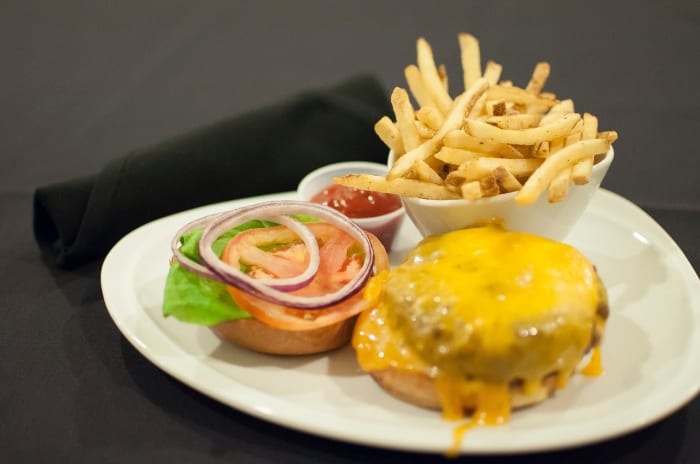 Hamburgers may seem like a relaxed, easy meal for a first date. But they can also be quite messy. If you are nervous on your first date, try a light, non-finger-food meal instead.