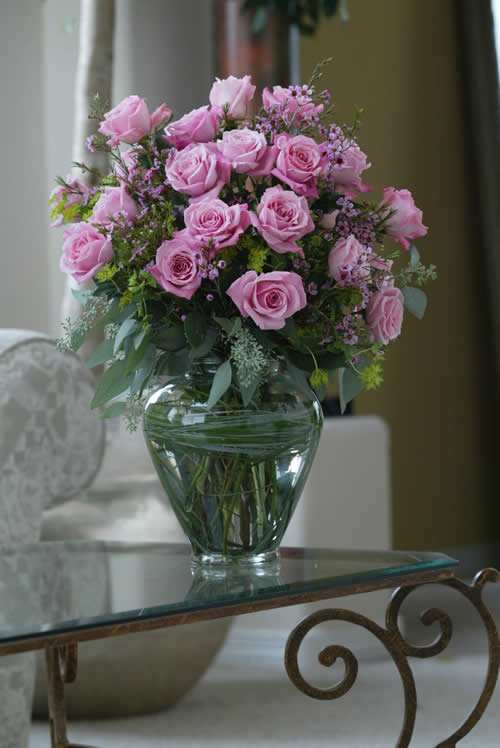 Pink roses represent innocent romantic love. They're a good color for teen romance or the early phases of a romantic relationship.