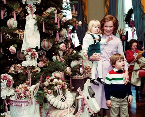 Mrs. Carter and her 1980 theme tree, "Old Fashion Victorian Christmas"