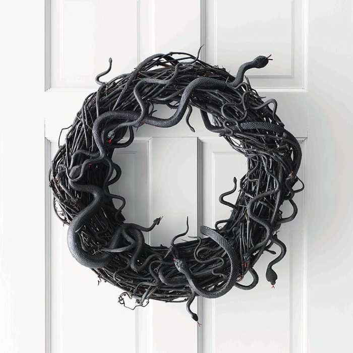 This was the first Halloween wreath that I made. I had bought a bunch of things to decorate for Halloween, among them a bag of snakes.