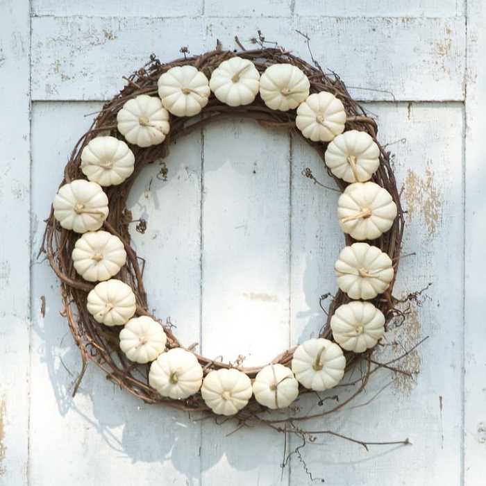 Wreath made using single color pumpkins. You can change this up to suit your decor or your design scheme.
