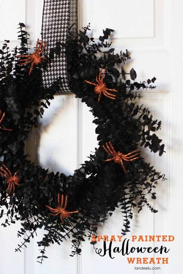 This one is easy enough. Make a wreath using eucalyptus. Spray paint using black. Add some creepy-crawlies.