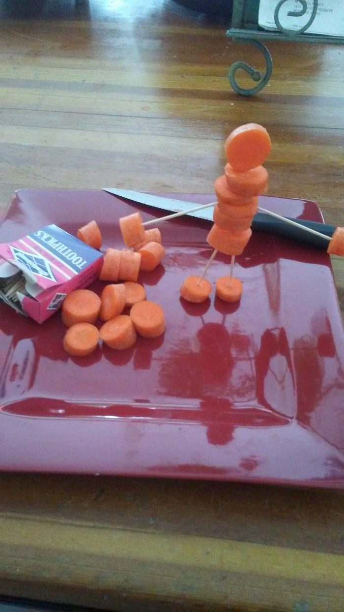 Let your kids get creative by making carrot sculptures. All you need are carrot circles, toothpicks, and a keen imagination.