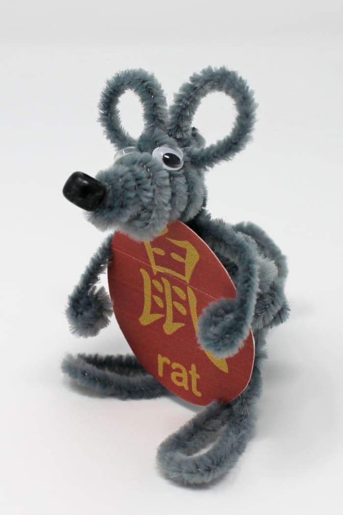Here is a finished rat made from pipe cleaners. The red circle with the "rat" character is available on the "Printable Templates, Batch 1" link earlier in this article.