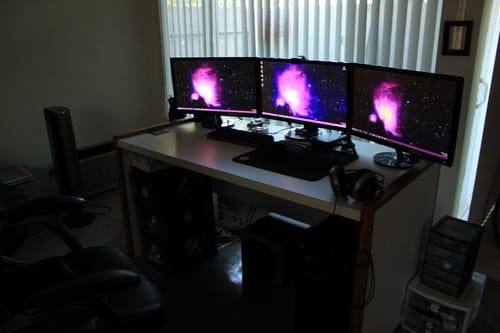 Another look at a triple monitor setup of the Asus VS239H-P. This inexpensive setup saves me quite a bit of time while working and looks great too.