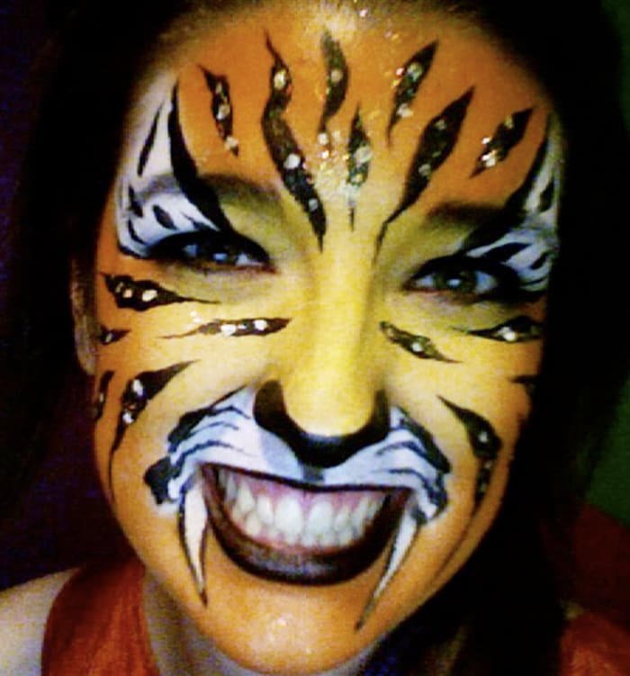 Kelsey The Face Painting Lady paints kids in the Portland, Oregon and Vancouver, WA areas.