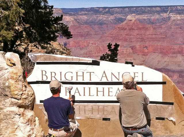 Handheld sandblasters can be used to etch glass or sandstone, as is happening above