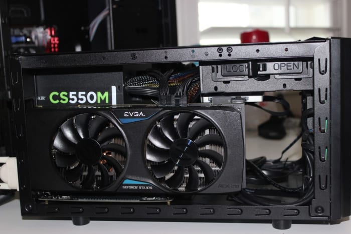 The shoebox size of the CM 130 along with full-sized PSU and GPU capabilities make it one of the better options. Pictured is a CM130 with an additional red LED fan.
