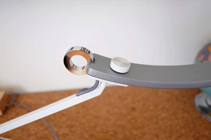 The chromed ring is a touch-activated on-off switch, and also controls the ambient light sensor mode.