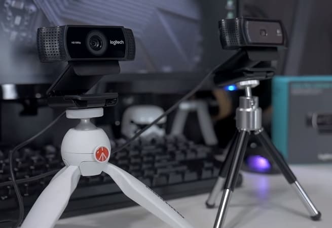 If you do end up using a webcam, I like one of these mini tripods to help you manage your shots. Pictured in front is the Manfrotto Mini Tripod.
