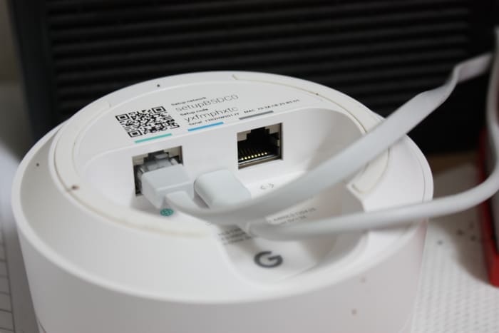 It comes with two ethernet ports and one electrical port. All we had to do was connect the ethernet cord, which comes with the Google Wifi, from the Google node to the modem.
