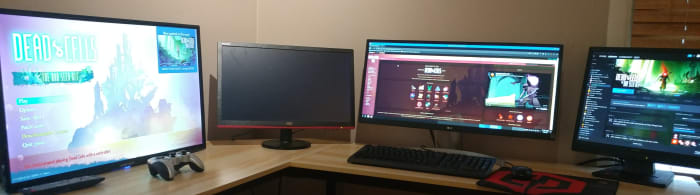 The Dead Cells game wiki is on the main screen. The game Dead Cells on the third screen. Steam is on the fourth screen.