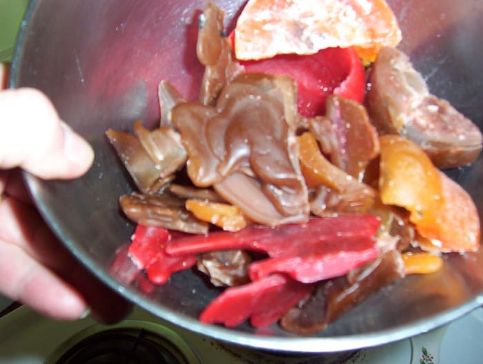 When choosing which leftover wax to mix for your new candle, be sure to select colors and scents that will combine harmoniously. In this case, I used browns, reds, and oranges.
