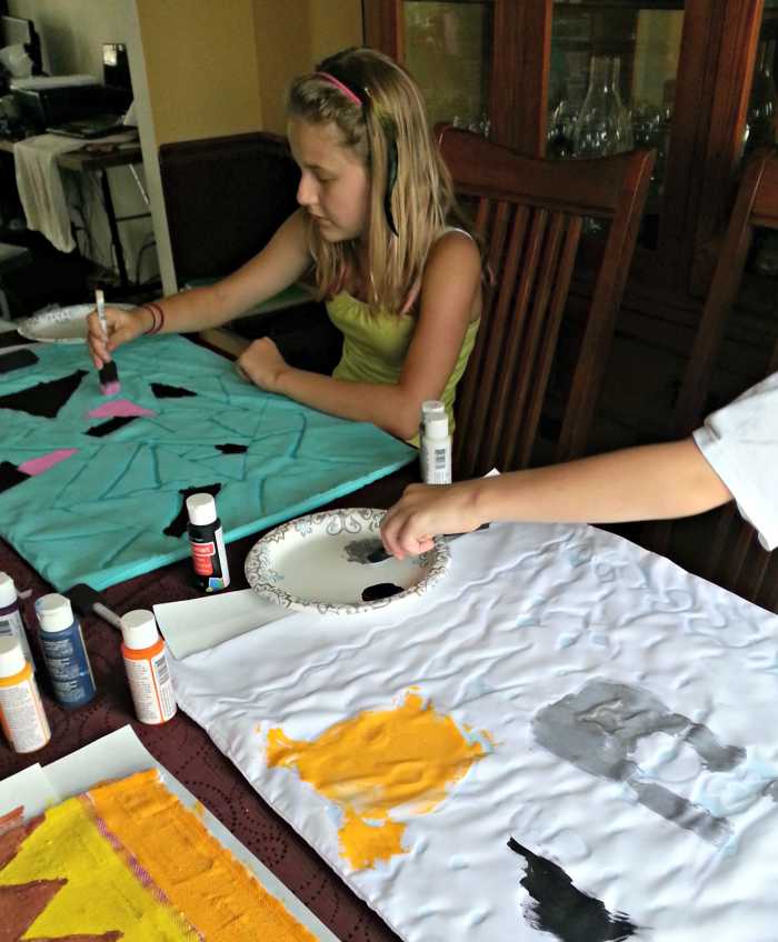 It's very important for the fabric to be completely covered in paint in order for the batik process to work.