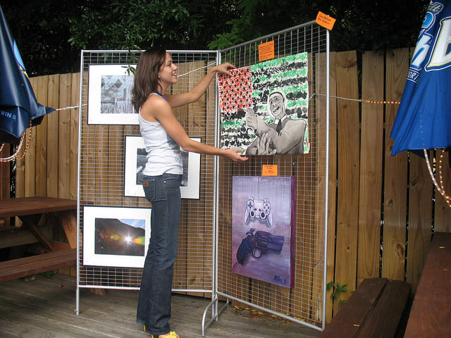 Making sure that your artwork is properly displayed, and prices are marked will help make the sale at an arts festival or crafts show.