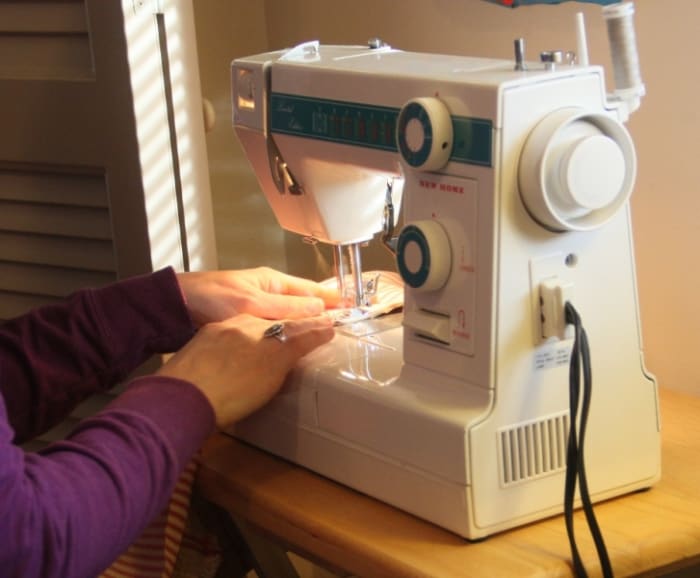 Sewing right sides together, all around save a small opening for turning.