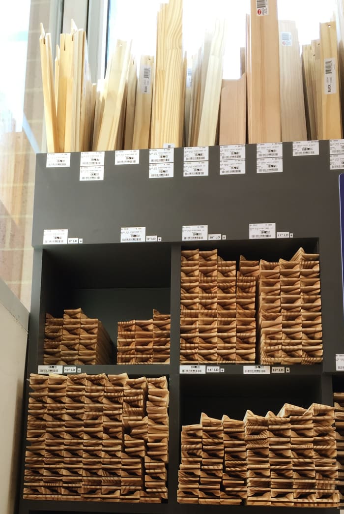 Stretcher bars are sold by size, ready to use. Pictured, stretcher rack at Dick Blick art materials store.