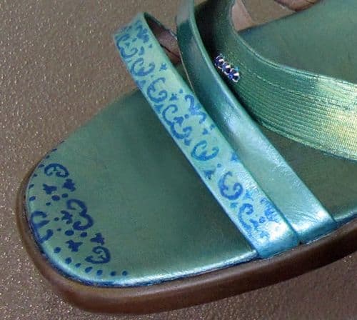 I painted freehand flourishes on the front edges that would peek out in front of my toes.