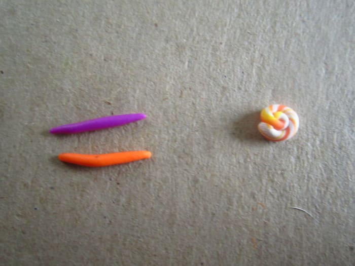 I already had a shell to use for her hair, but for the purpose of this demonstration I made a new one with orange and purple coils.