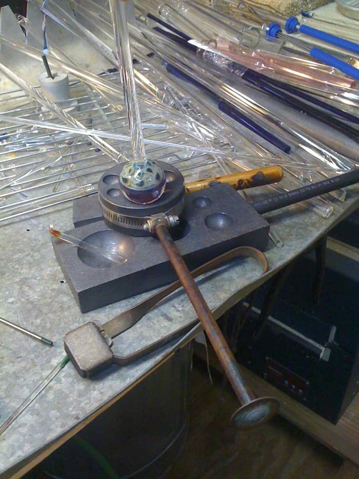 Shaping the finished marble. After this step all that is left is cutting it off the stem and firing it in the kiln.