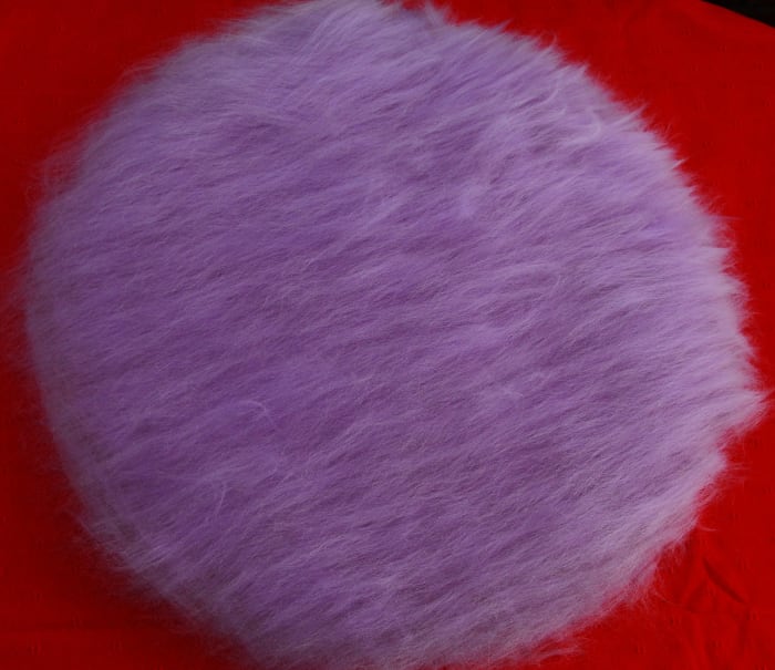 Layer three - laid in opposite direction whilst trying to make it as even as possible. If you have any thin spots top them up a little. Felting is not an exact science, there is no wrong way, experiment and enjoy it. It can be very forgiving.