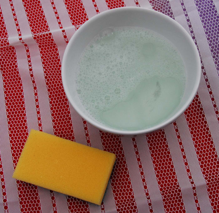 Prepare a bowl of boiling water with a dash of dish washing liquid in it. Not too much, a little goes a long way! Take care not to burn yourself.