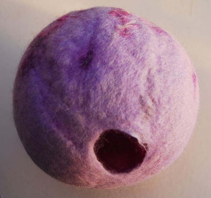 Close-up of my pod, a little thin perhaps!. I should have added a fourth layer! Different wool produces different results but felt fortunately is forgiving! There are many ways to 'tart' up your pod. More about this later!