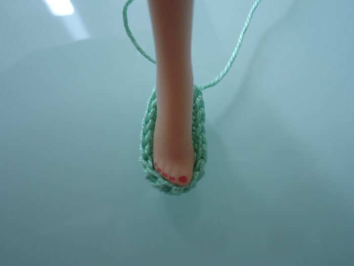I used a solid color thread for the step-by-step pictures. Unfortunately, I ran out of the color to make a pair and had to frog it.