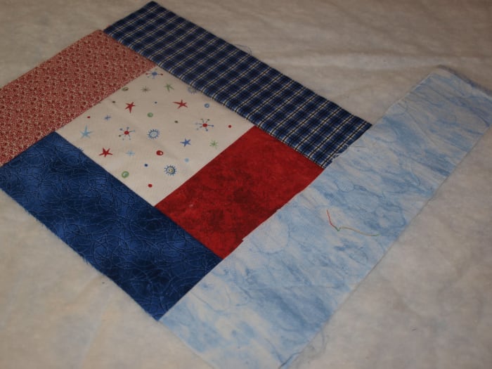 After checking different fabrics, I settled on this light blue one for the next strip.